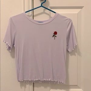 a tight purple shirt